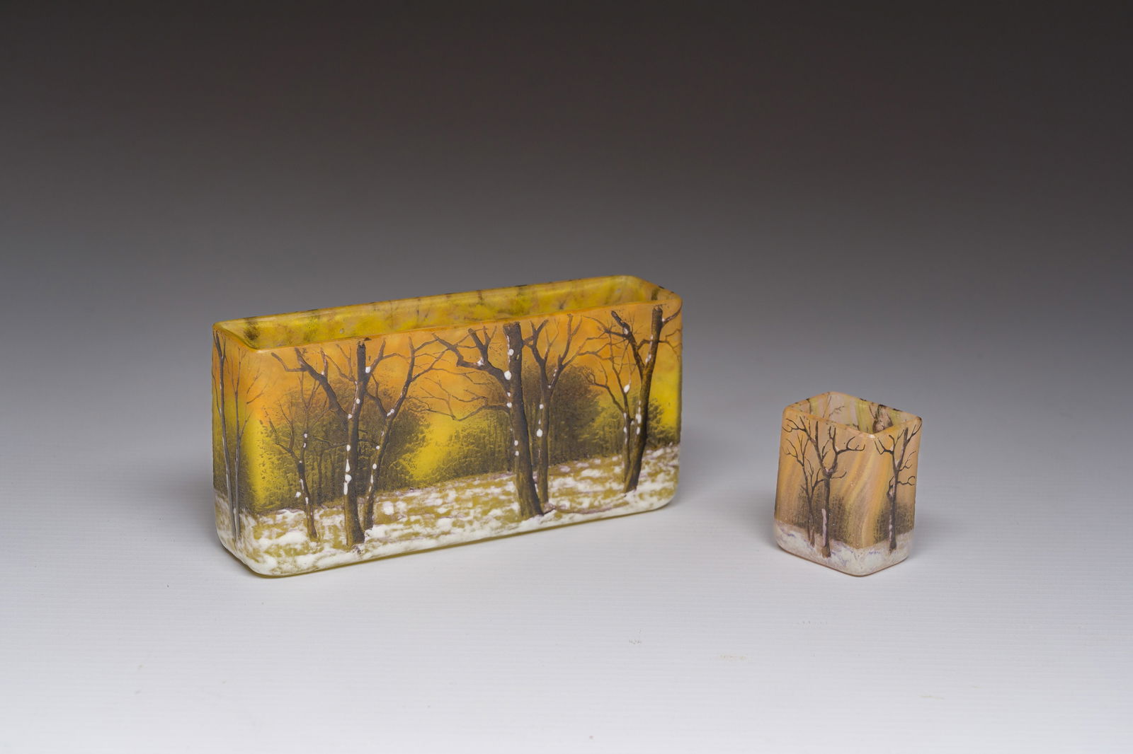 Two French acid-etched multi-layered rectangular 'winter landscape' vases, marked Daum Nancy, ca. (1 of 8)