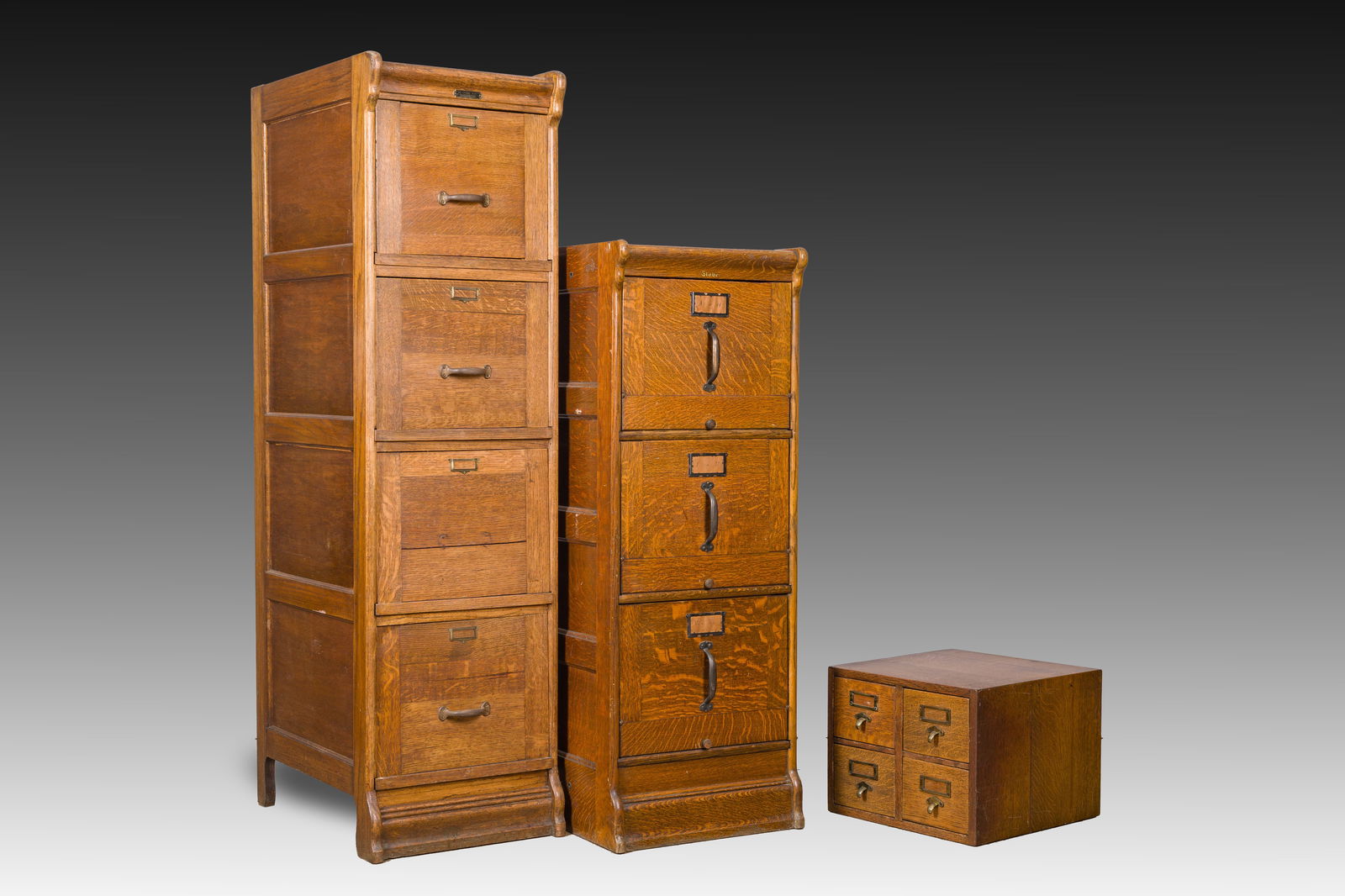 Two wooden filing cabinets, Globe Wernicke and Au Chêne Vert, and a four compartment storage box, (1 of 8)