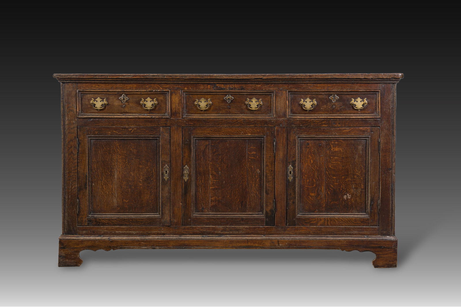 A sideboard with three doors and three drawers, late 18th C. (1 of 6)