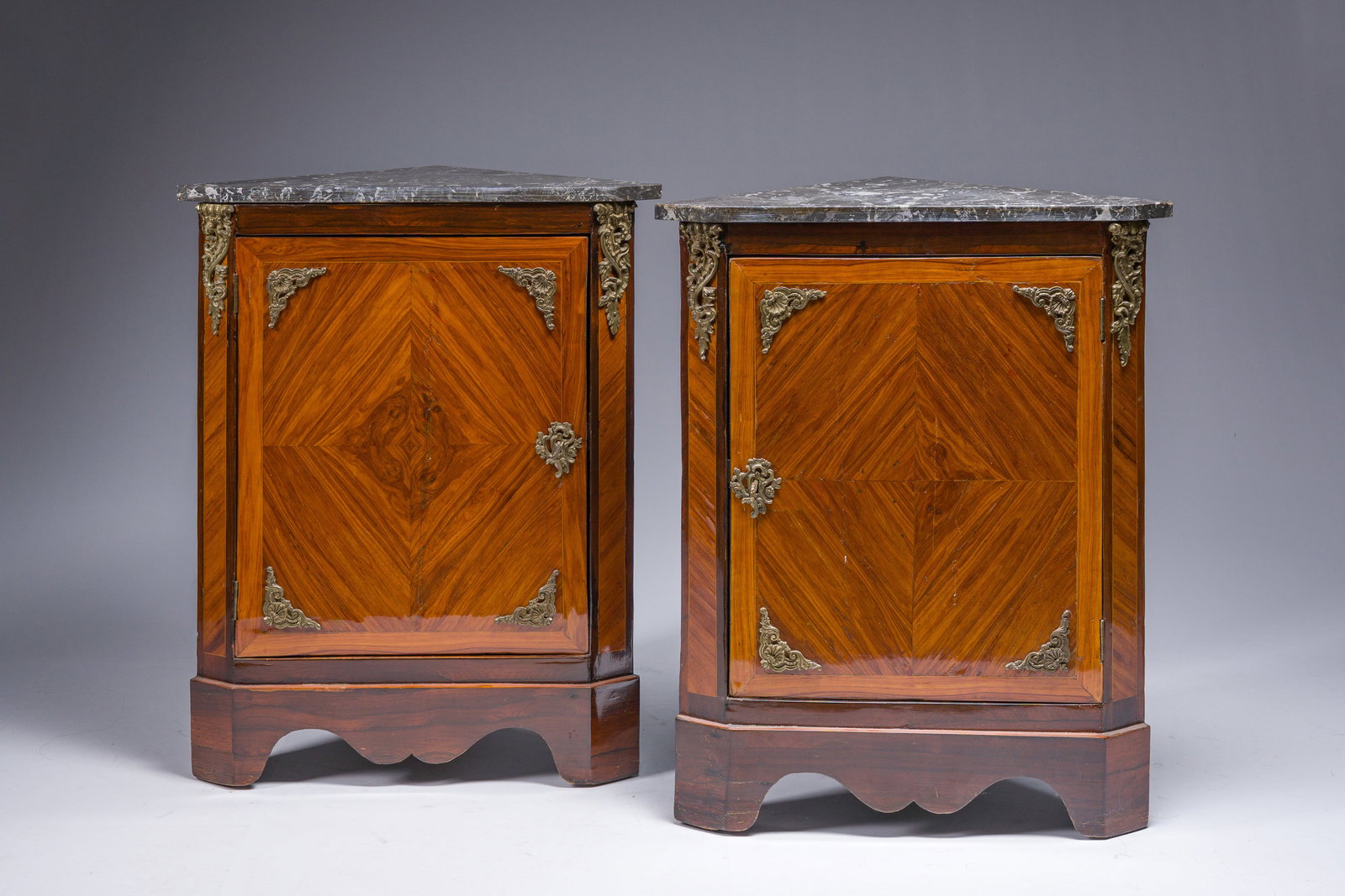 A pair of French Louis XVI marquetry corner cabinets with gilt bronze mounts and grey marble tops (1 of 7)