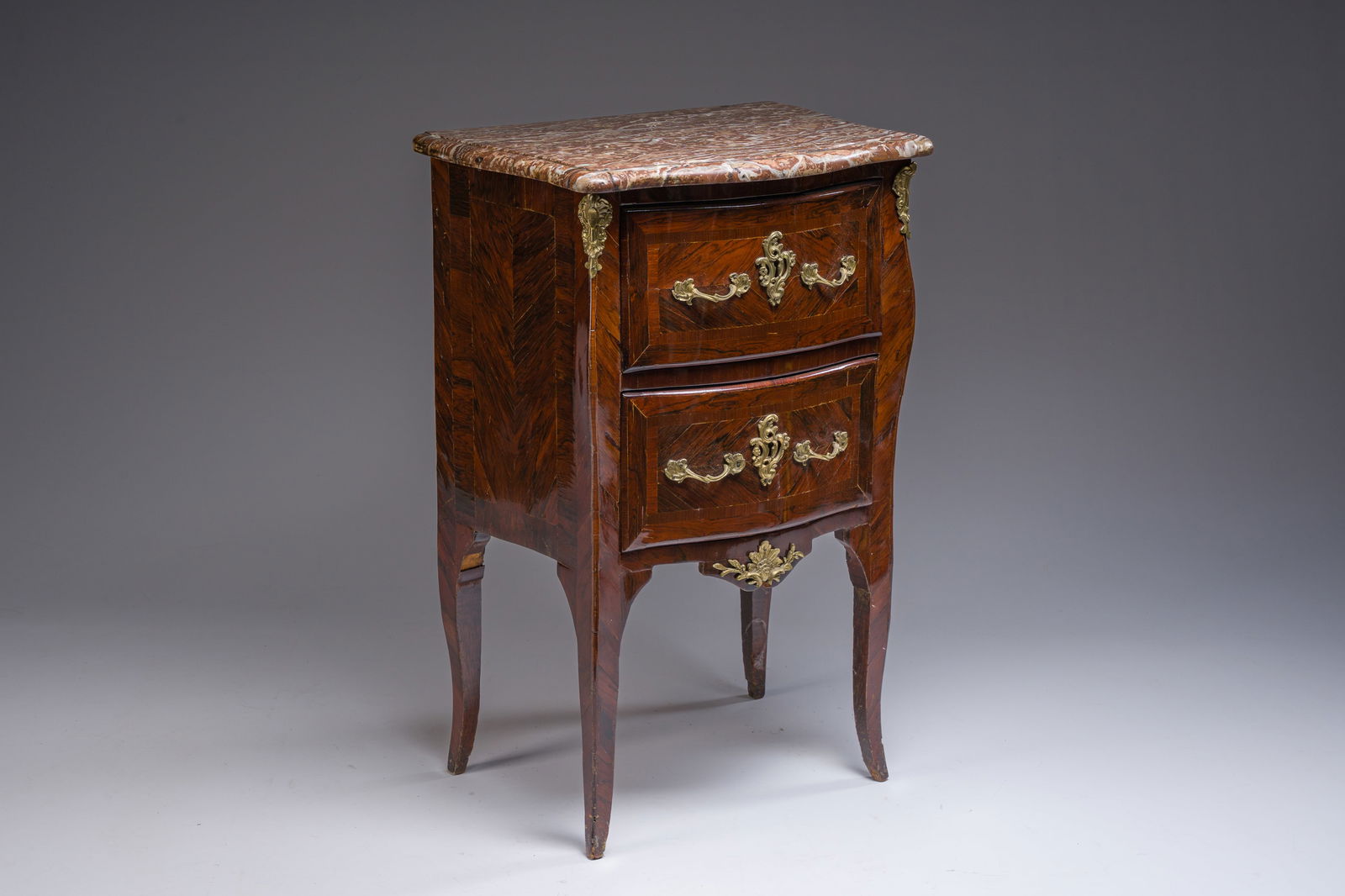 Jean-Pierre Latz (1691-1754): A small Louis XV marquetry commode with gilt bronze mounts and red: Jean-Pierre Latz (1691-1754): A small Louis XV marquetry commode with gilt bronze mounts and red marble top H 81 - L 54 - D 38 cm