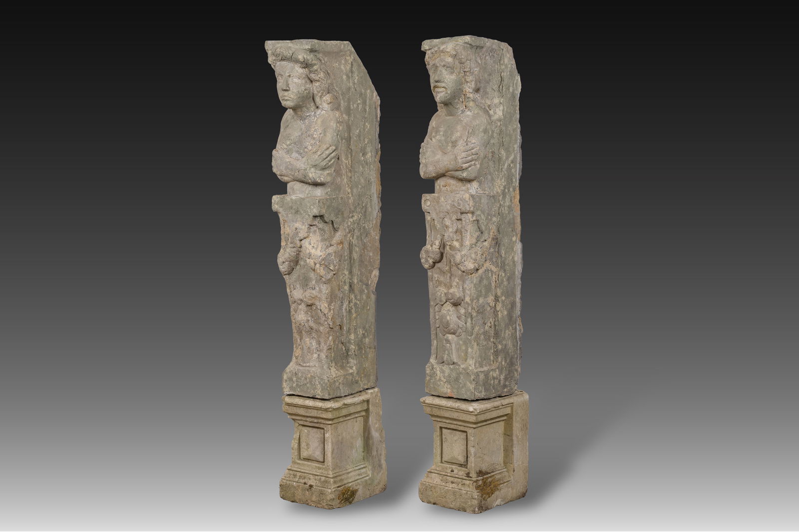 A pair of carved stone mantelpiece pillars in the shape of a man and a woman, probably Flanders, (1 of 7)