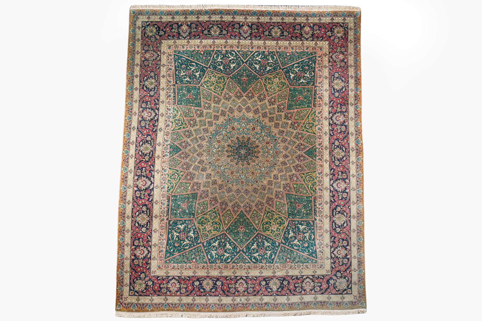 A Persian Tabriz rug with floral design, wool on cotton, first half 20th C. (1 of 5)