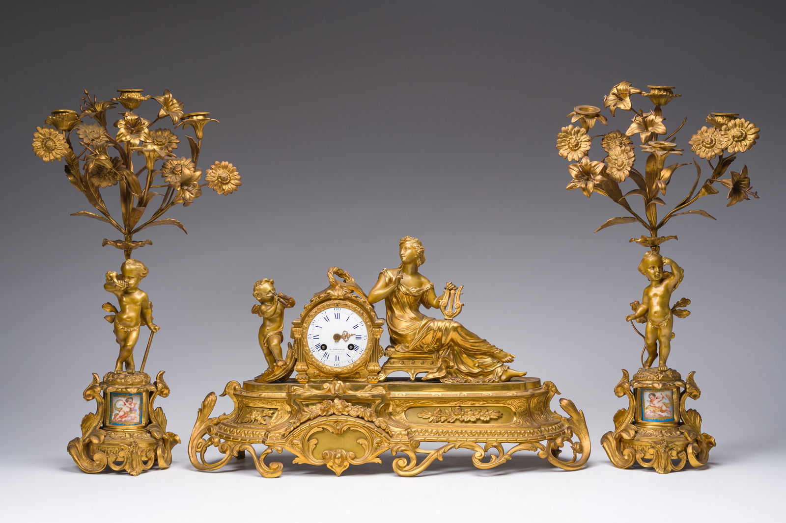 A French gilt bronze three-piece clock garniture with Erato, playful putti and Sèvres style (1 of 18)