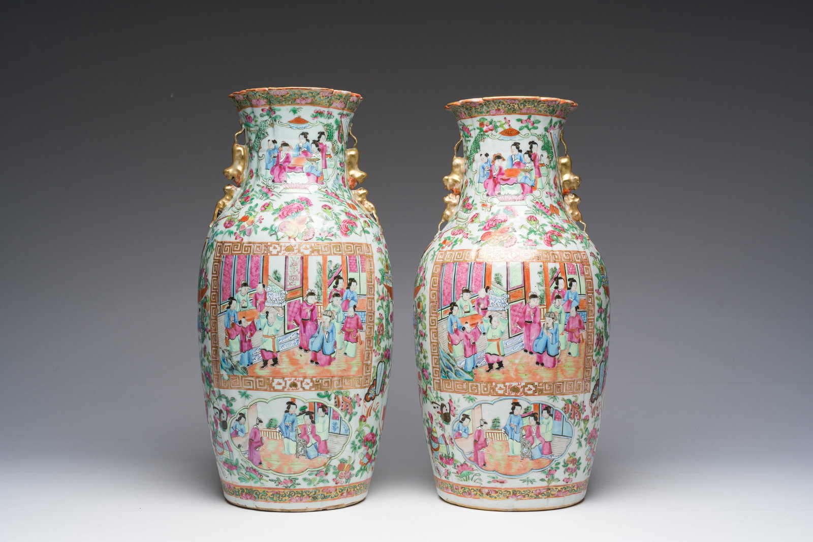 A pair of Chinese Canton famille rose vases with palace scenes and floral design, 19th C. (1 of 6)