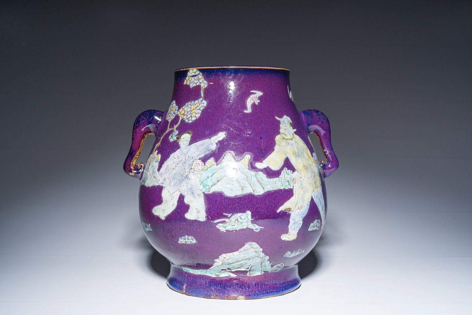 A Chinese flambe glazed 'hu' vase with figurative design, 20th C. (1 of 6)