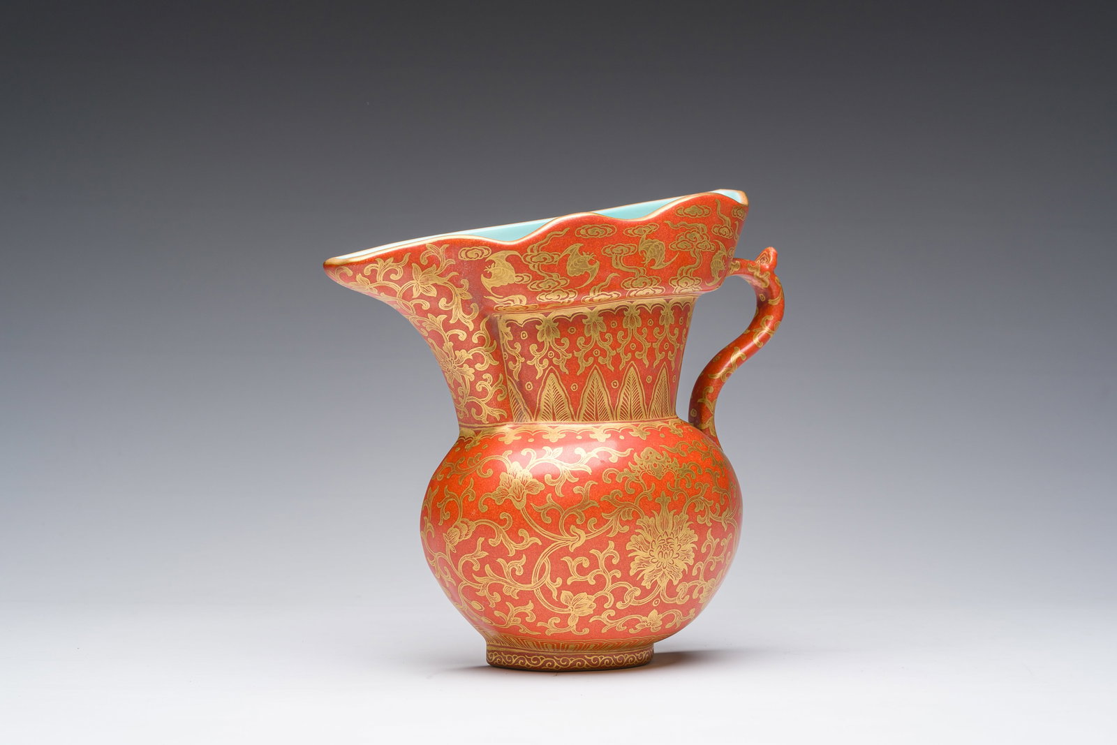A Chinese ewer-shaped coral-red ground wall pocket vase with gilt lotus scrolls, Qianlong mark, 20th (1 of 7)