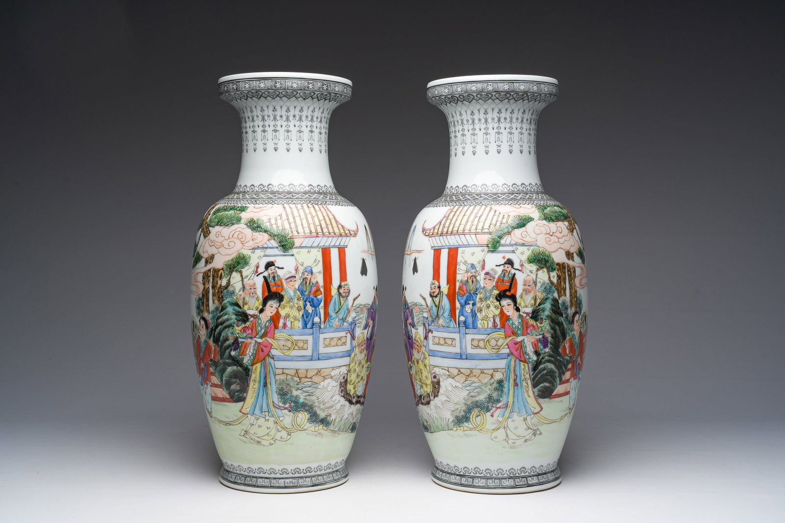 A pair of Chinese famille rose 'Immortals' vases, Qianlong mark, 20th C. (1 of 6)
