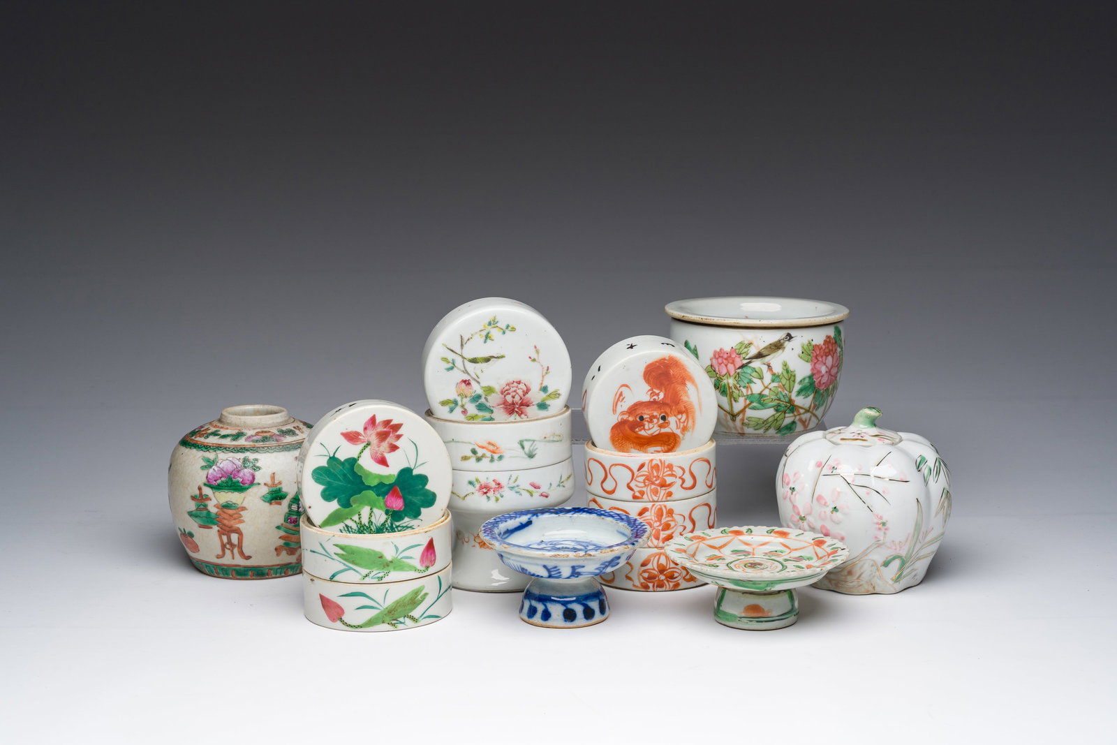 A varied collection of Chinese famille rose, blue, white, iron-red, and qianjiang cai porcelain, (1 of 11)