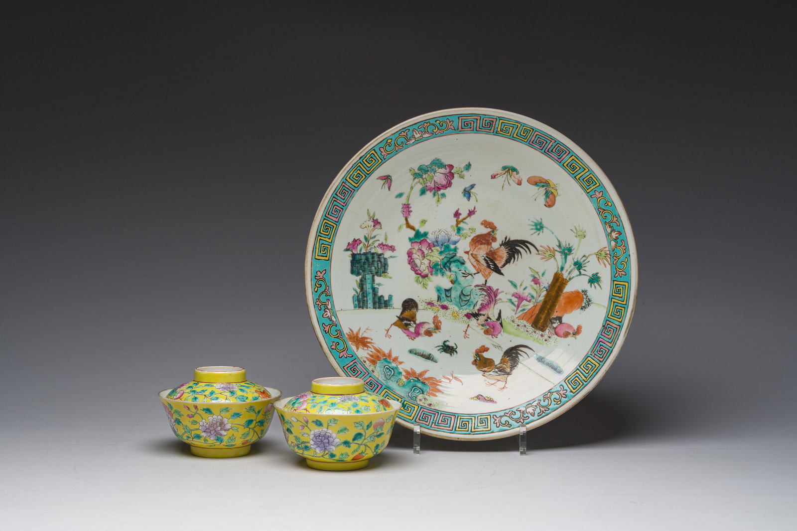 A Chinese famille rose 'roosters' dish and a pair of yellow-ground bowls and covers with floral (1 of 9)