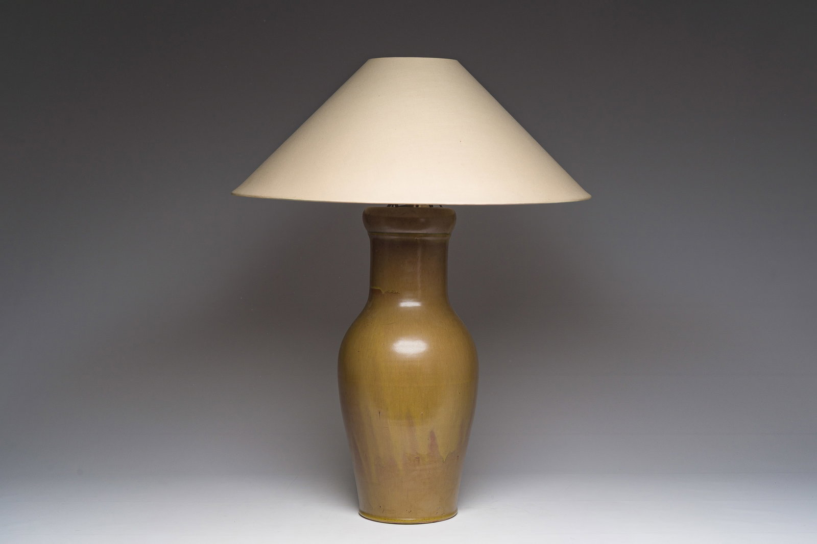 A Chinese monochrome 'teadust' glazed vase mounted into a lamp, 18th/19th C. (1 of 7)