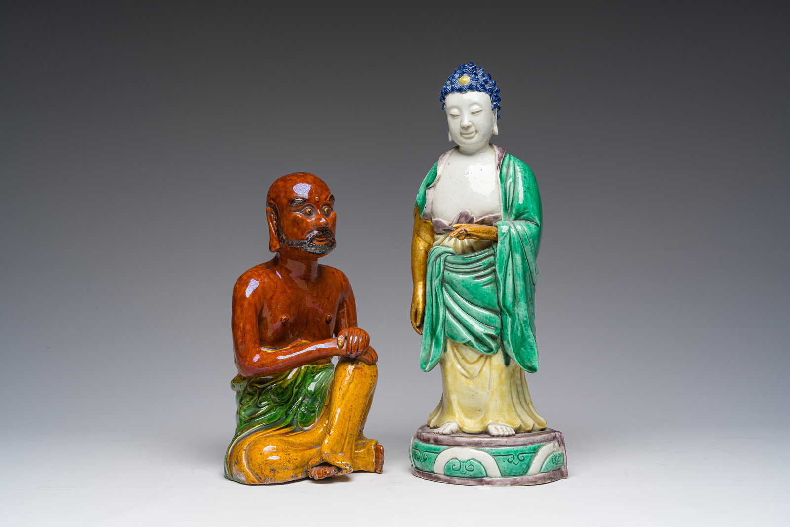 Two Chinese sancai pottery and verte biscuit figures, 19th C. (1 of 7)