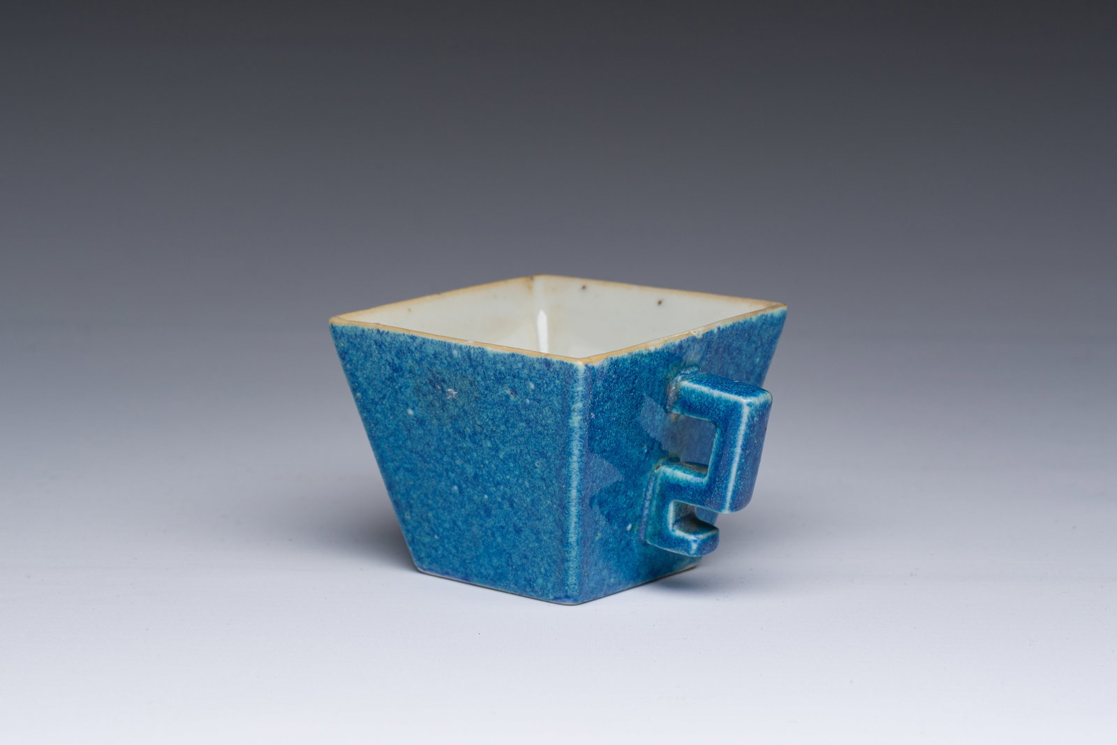 A Chinese robin's egg glazed tapering square cup, 18th C.: A Chinese robin's egg glazed tapering square cup, 18th C. H 5 - L 8 cm