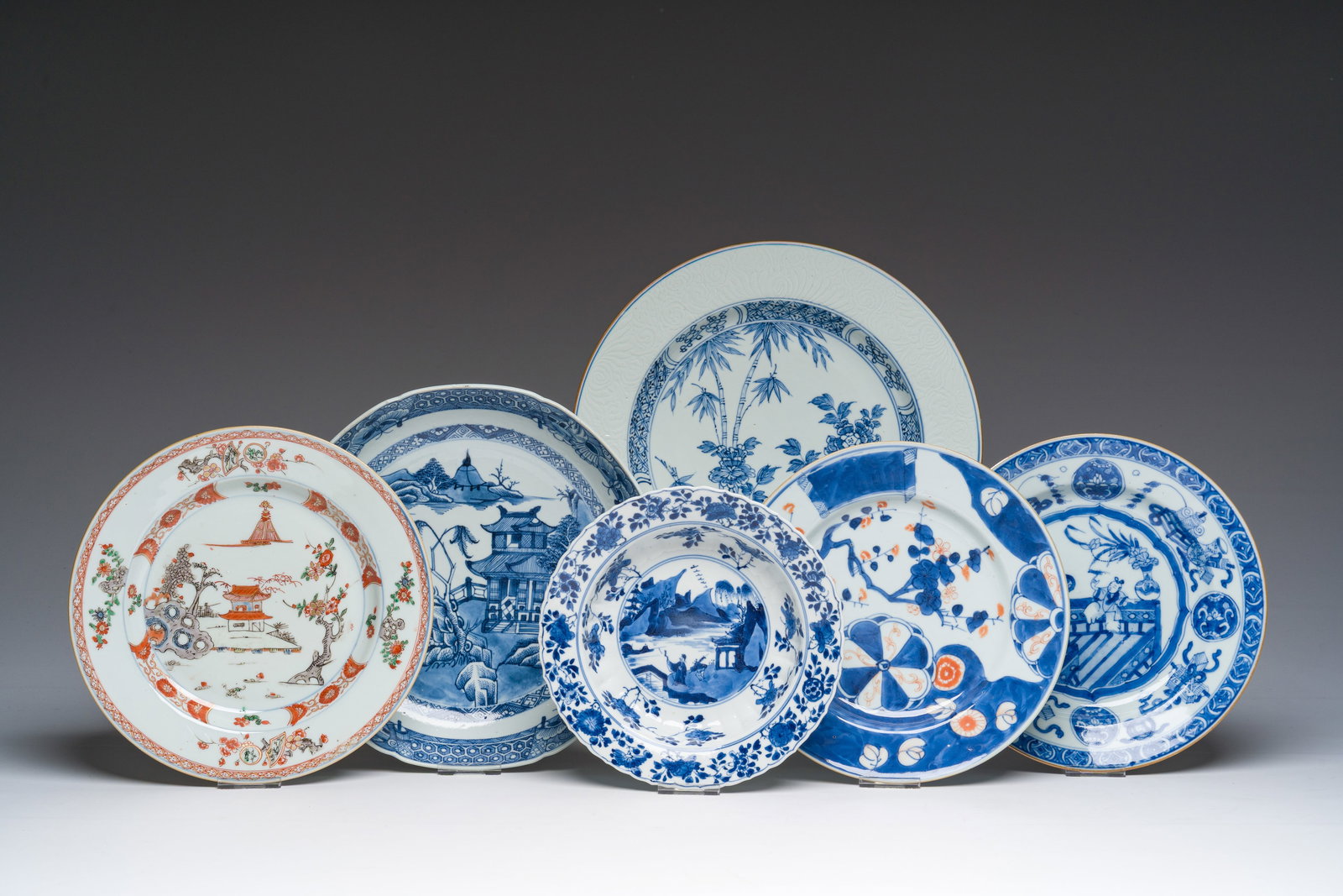 Six Chinese blue, white, famille verte and Imari style plates with landscapes, figures and floral (1 of 5)