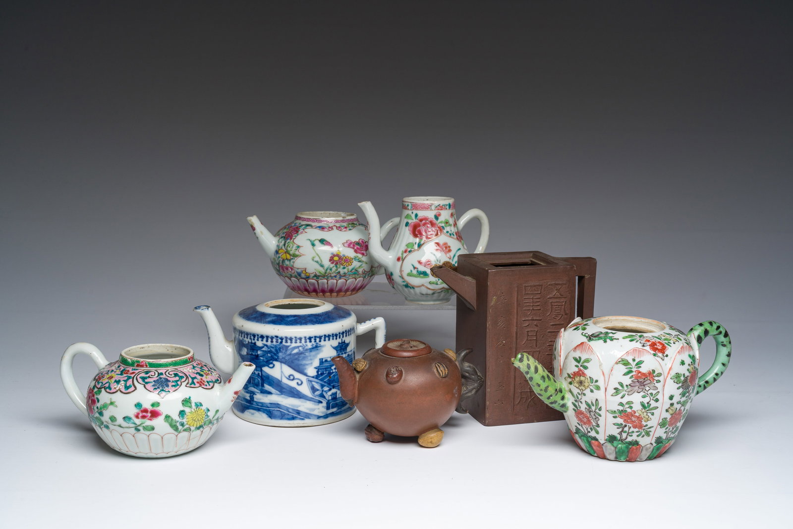 Seven Chinese blue, white, famille rose, verte and Yixing stoneware teapots, Kangxi and later (1 of 7)