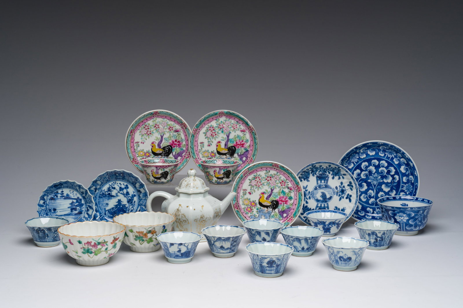 A varied collection of Chinese blue, white and famille rose cups and saucers and a gilt decorated (1 of 14)