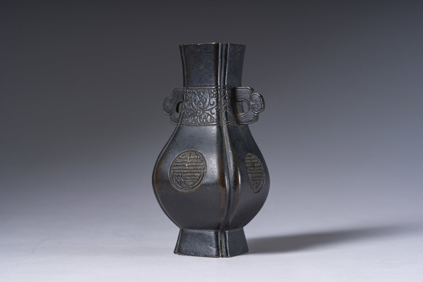 A Chinese bronze 'Shou' vase, Qing (1 of 8)