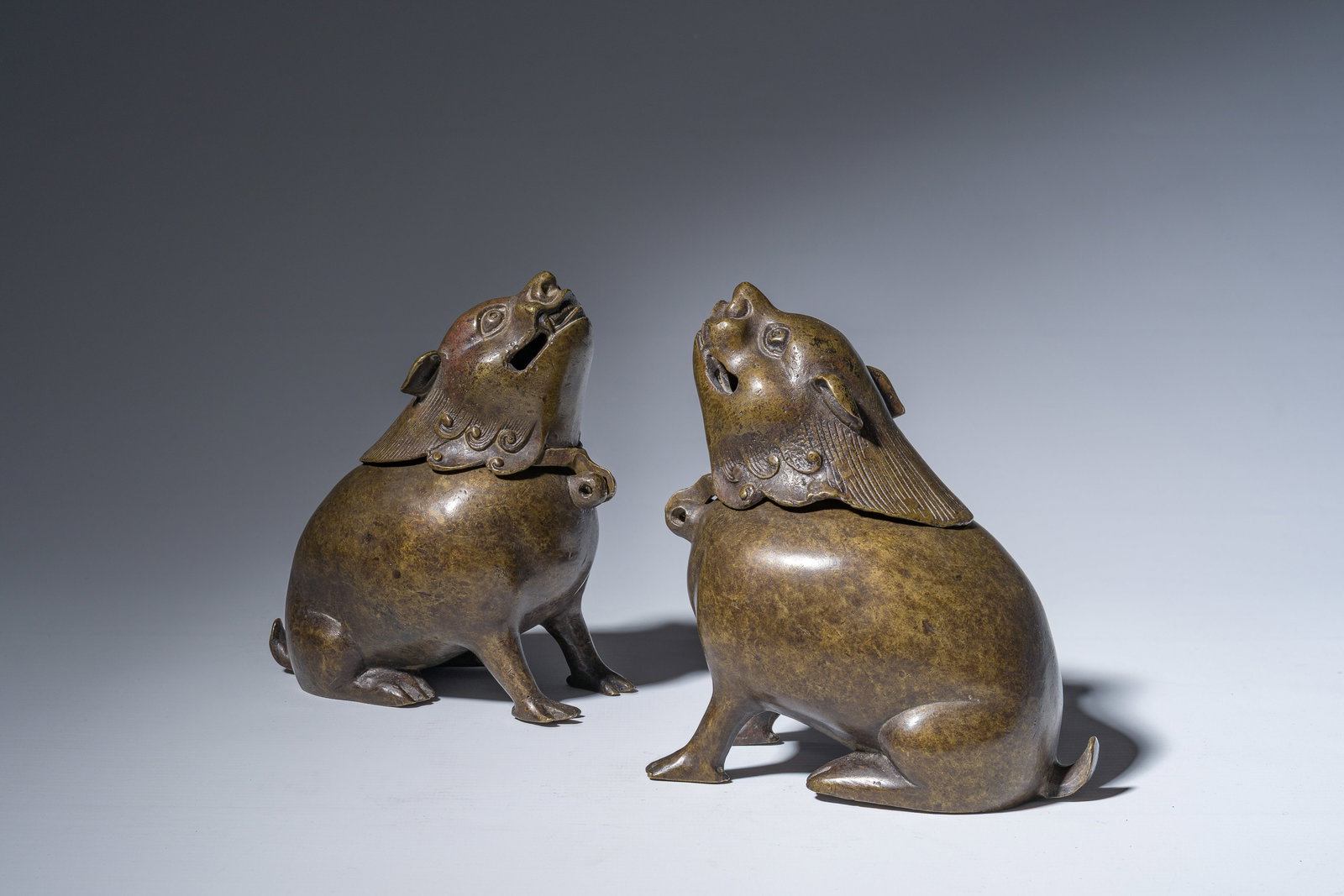 A pair of Chinese bronze incense burners in the shape of a mythical creature, 19th/20th C. (1 of 7)