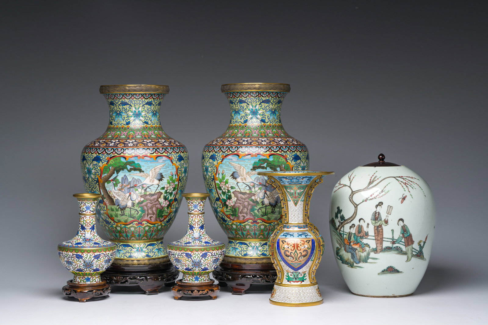 Five Chinese cloisonne vases with cranes, taotie masks and floral design and a famille rose jar and (1 of 9)