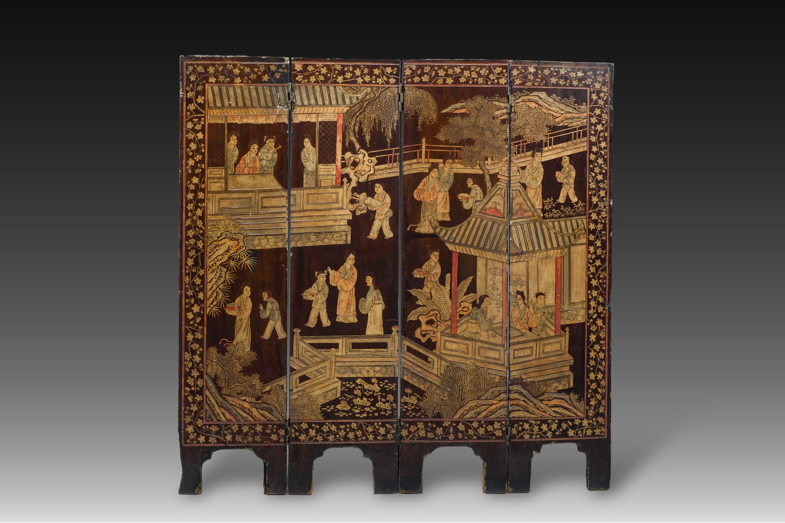A Chinese four-panel lacquer coromandel screen with an animated scene and birds among blossoming (1 of 2)