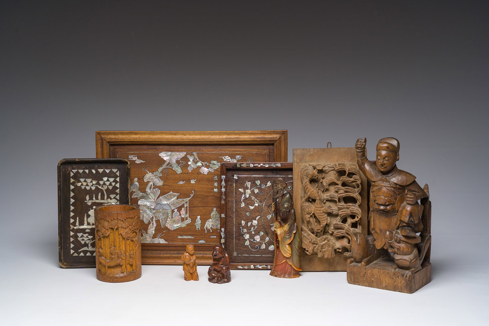 A varied collection of Chinese wooden objects and a horn Shou Lao sculpture, 19th/20th C. (1 of 11)