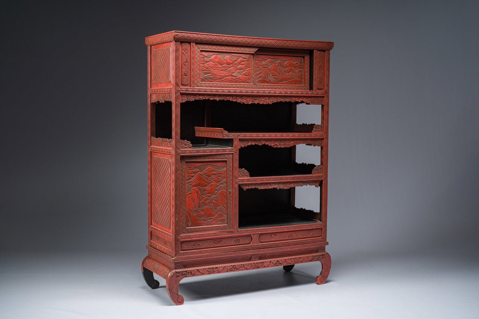 A Japanese red lacquer cabinet, Meiji/Showa, 19th/20th C. (1 of 8)