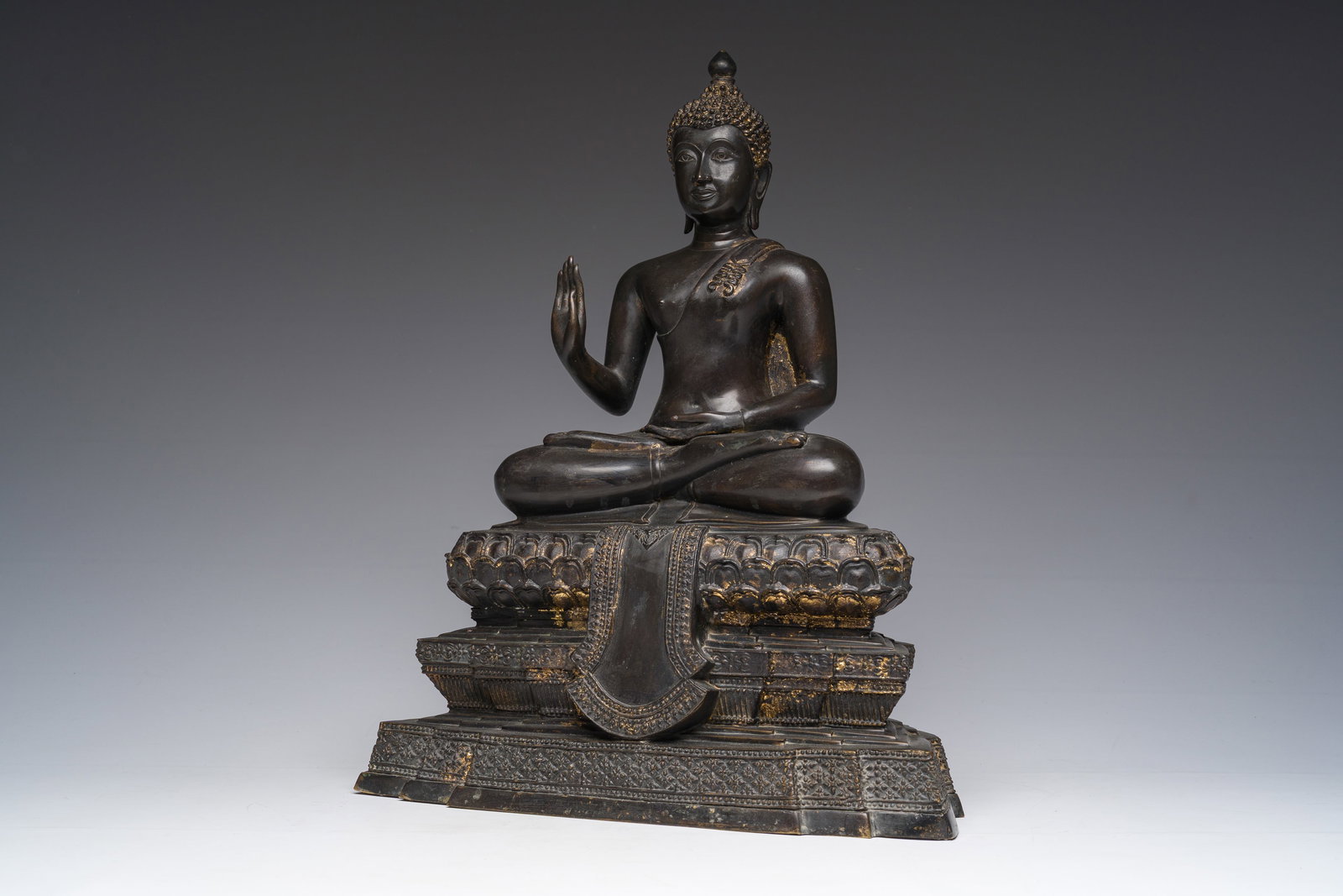 A Thai bronze sculpture of the seated Buddha with traces of gilding, Rattanakosin, 18th/19th C. (1 of 8)