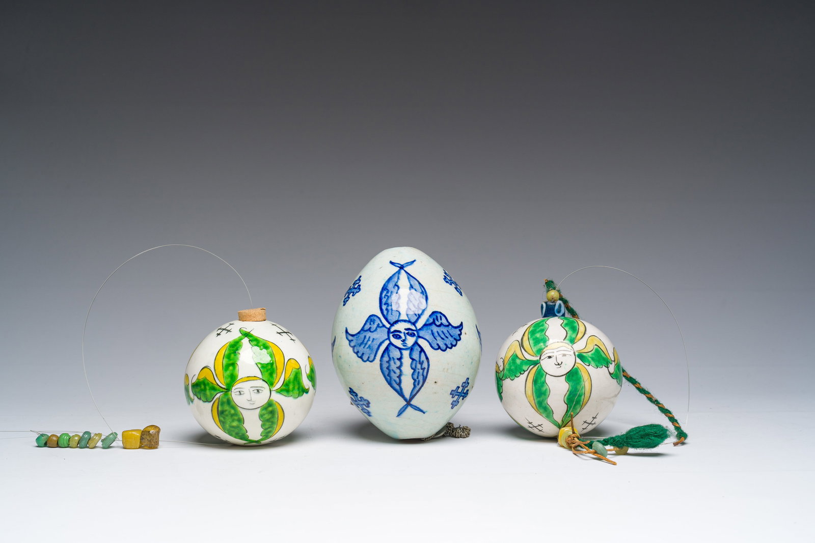 A blue and white oval and two polychrome round hanging ornaments, Kutahya, Turkey, 18th/19th C. (1 of 6)