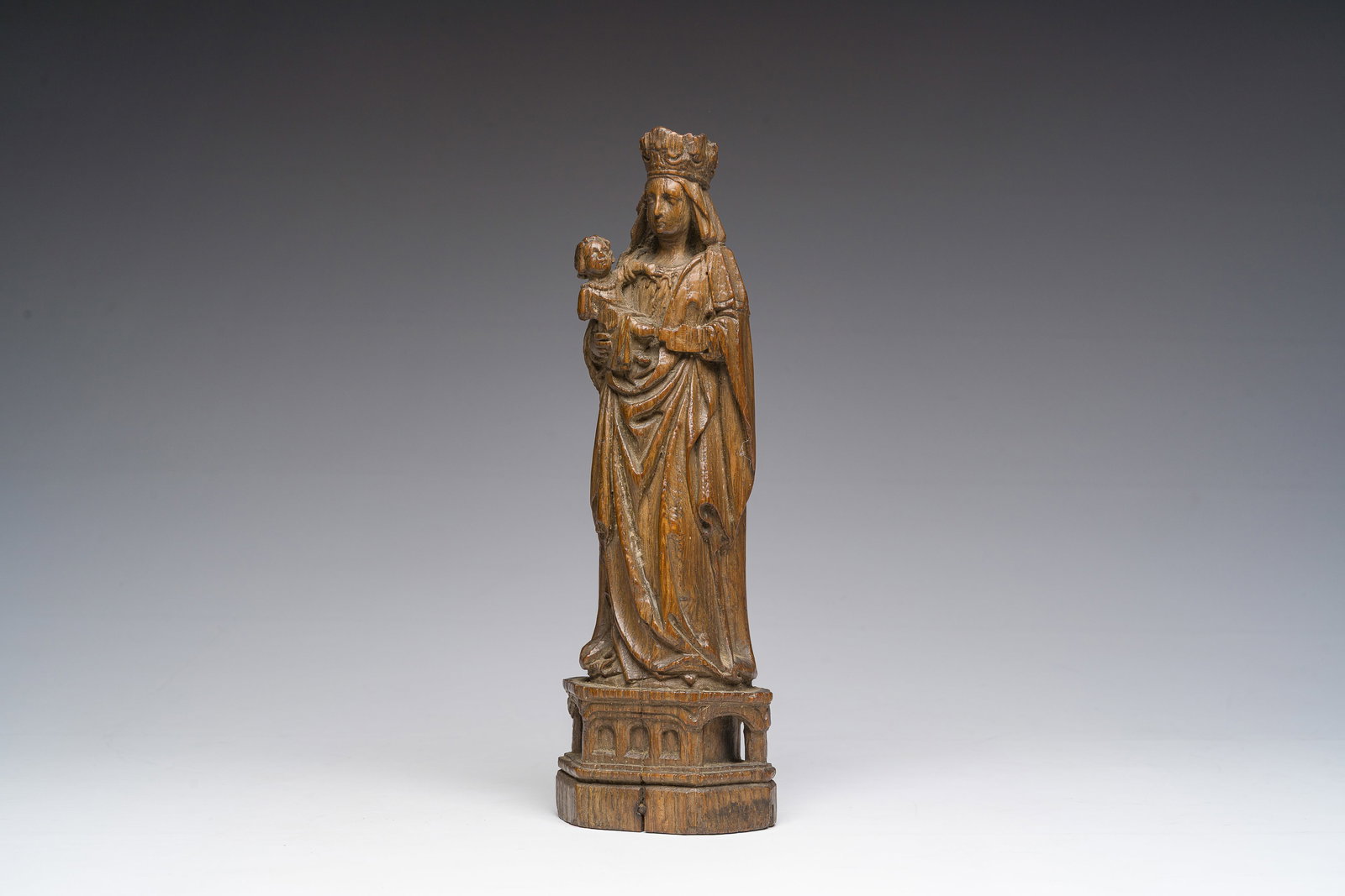 A Gothic revival carved oak Madonna and Child modeled after 15th-C. Utrecht clay models, 19th C. (1 of 7)
