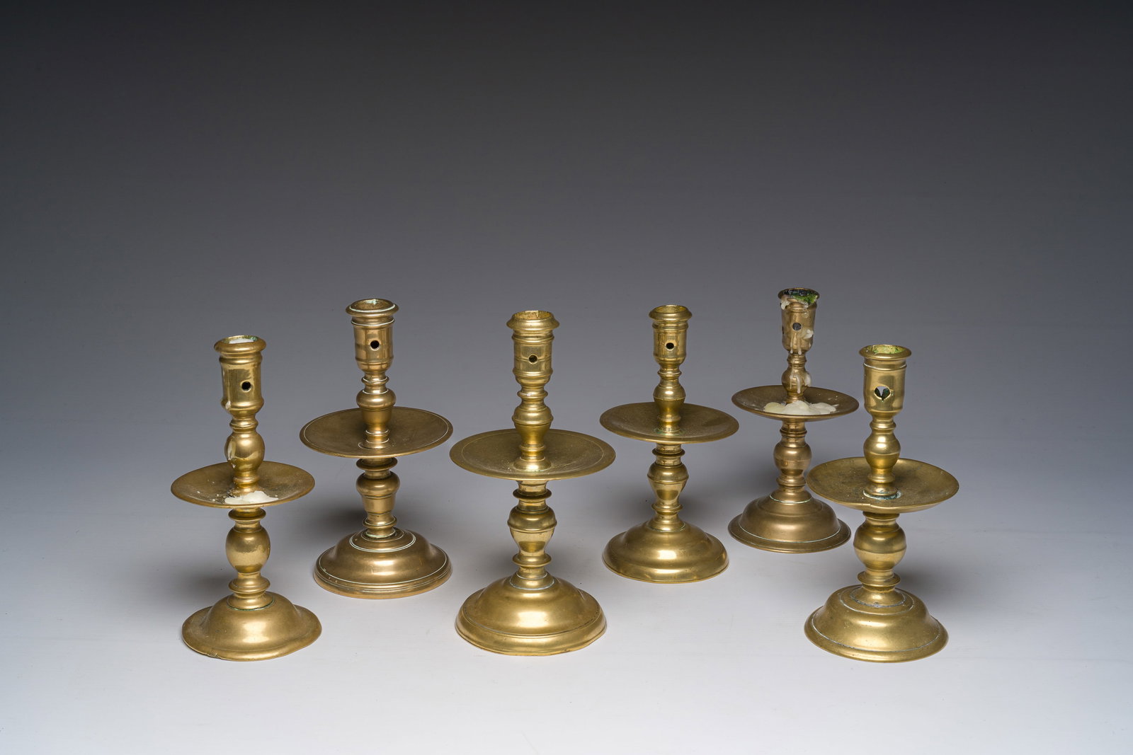 Six Flemish bronze disc candlesticks, 17th C. (1 of 7)