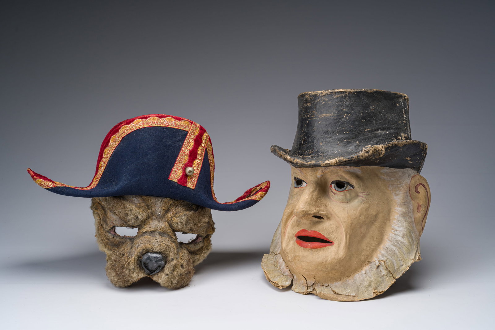 A French RTLN Opera de Paris 'Orpheus in the Underworld' mask and a papier-mâche carnival mask, (1 of 9)