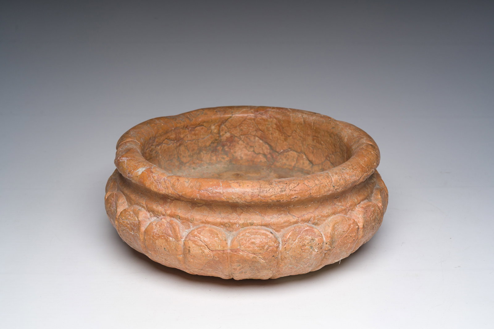 An Italian gadrooned Rosso Verona marble basin, 17th/18th C. (1 of 7)