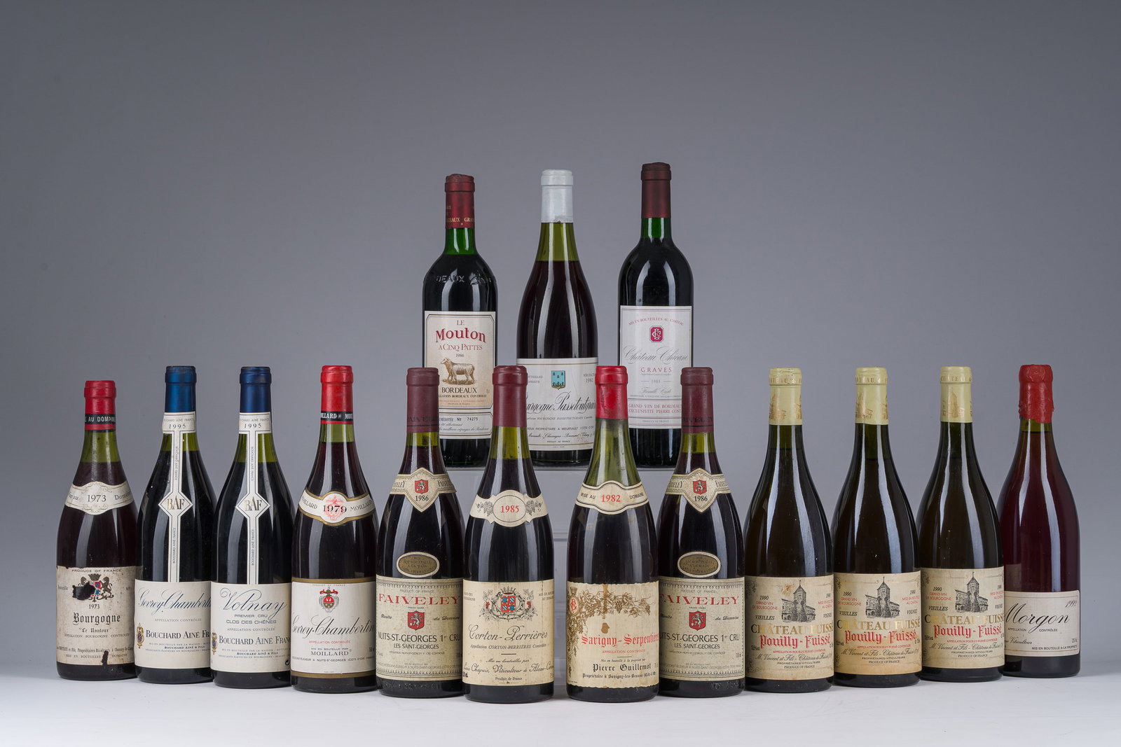 1973-1995 Volnay Premier Cru, Chablis Les Clos, Nuits St Georges, etc., 15 flessen: 1973-1995 Volnay Premier Cru, Chablis Les Clos, Nuits St Georges, etc., 15 flessen 75 cl 1995 Volnay Premier Cru, Clos de Chenes Bouchard Aîne, 1 bottle1995 Gevrey-Chambertin, Bouchard Aine, 1 bottle