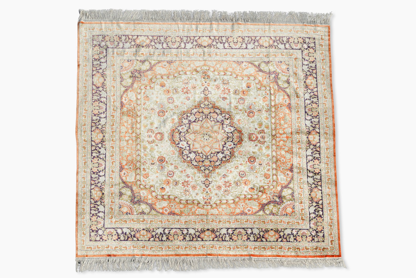 A Chinese silk Hereke style rug with floral design, 20th C. (1 of 5)