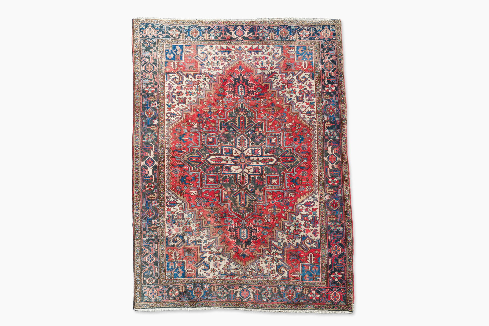 A Persian Heriz rug with floral design, wool on cotton, 20th C. (1 of 6)