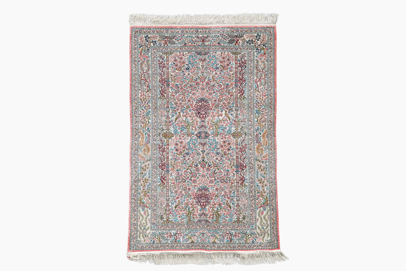 A Chinese silk Hereke style rug with birds among blossoming branches, 20th C. (1 of 6)