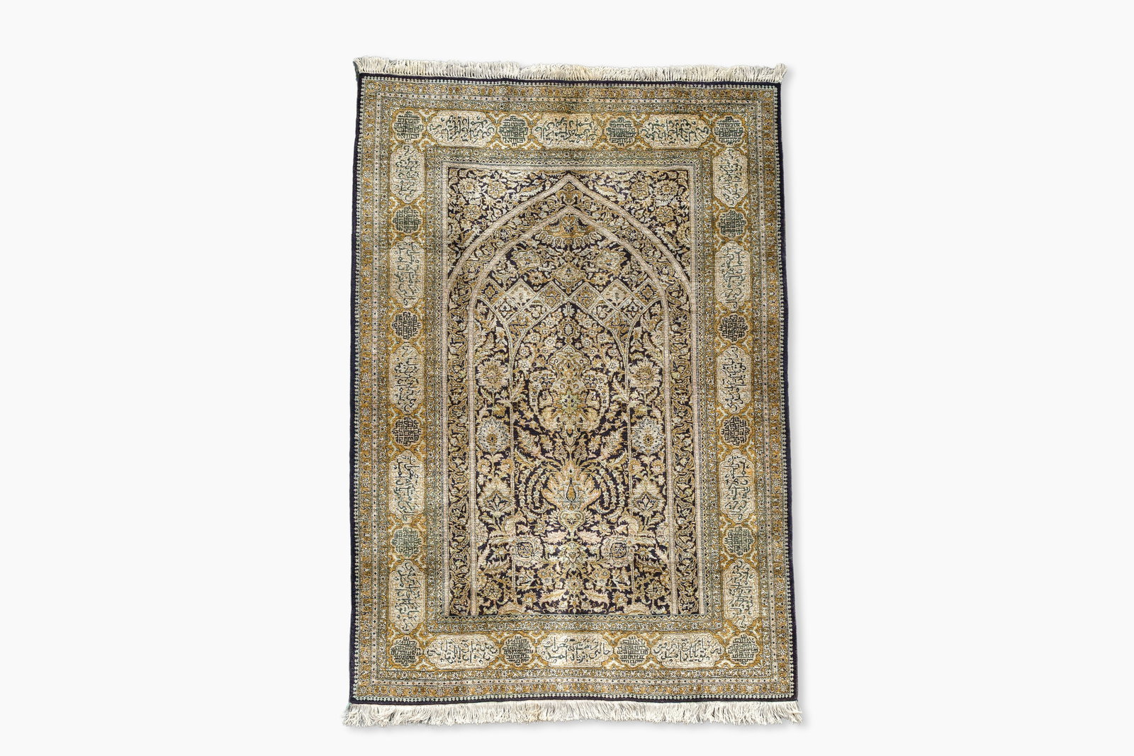 A Persian Qom (Qum/Ghom) silk rug with floral design and calligraphy, Mahneb, third quarter 20th C. (1 of 6)