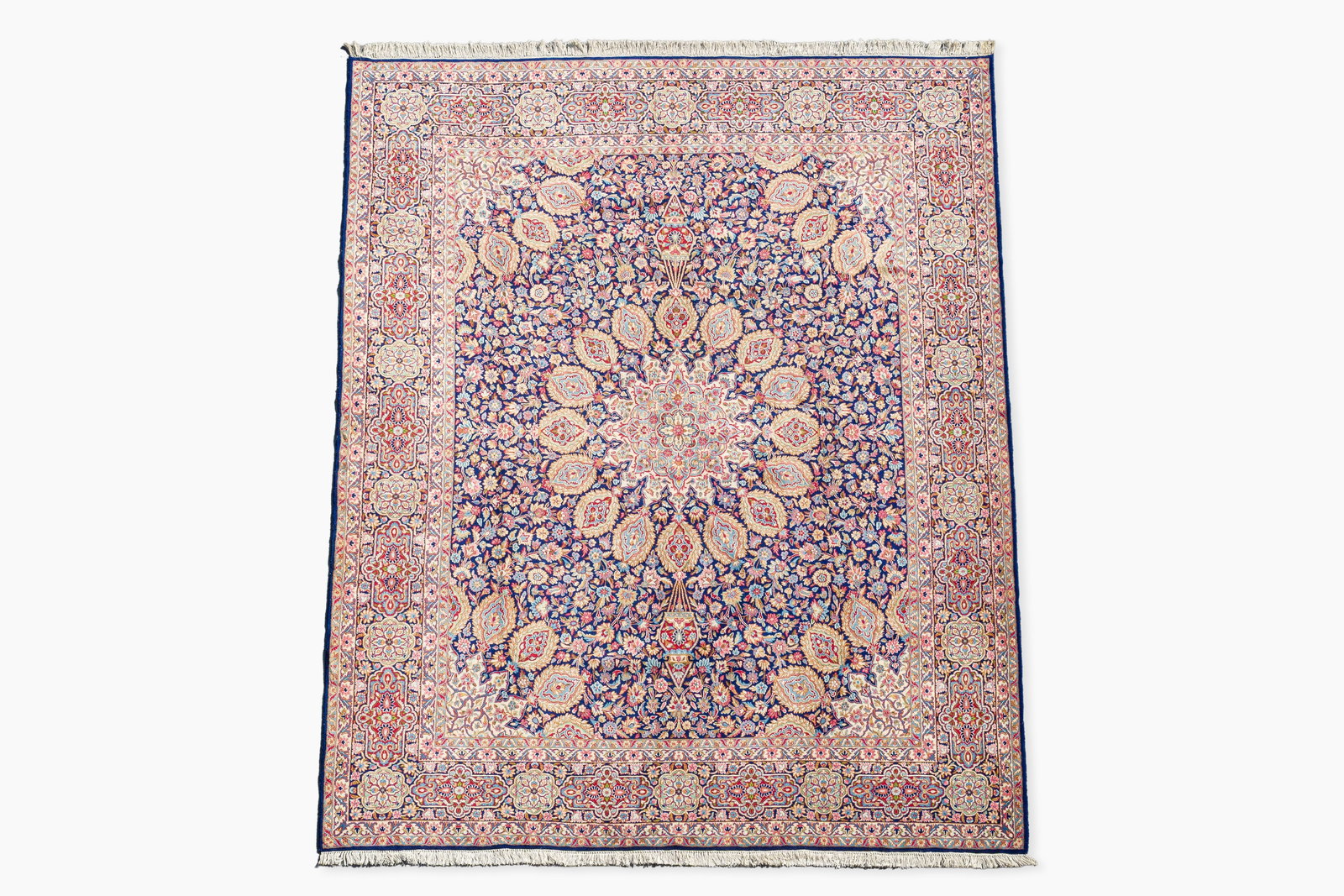 A Persian Kerman (Kirman) rug with floral design, wool on cotton, 20th C. (1 of 5)