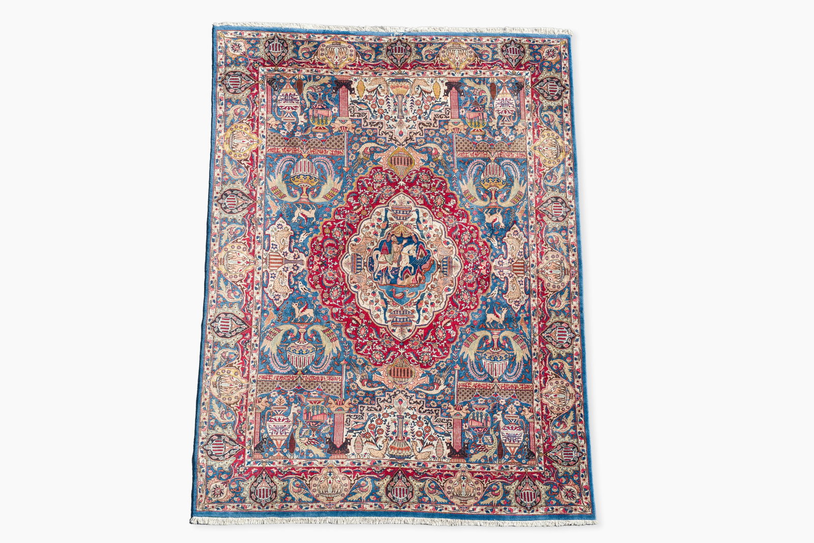 A Persian Kashmar rug with antiquities and floral design, signed Taji, wool on cotton, 20th C. (1 of 10)