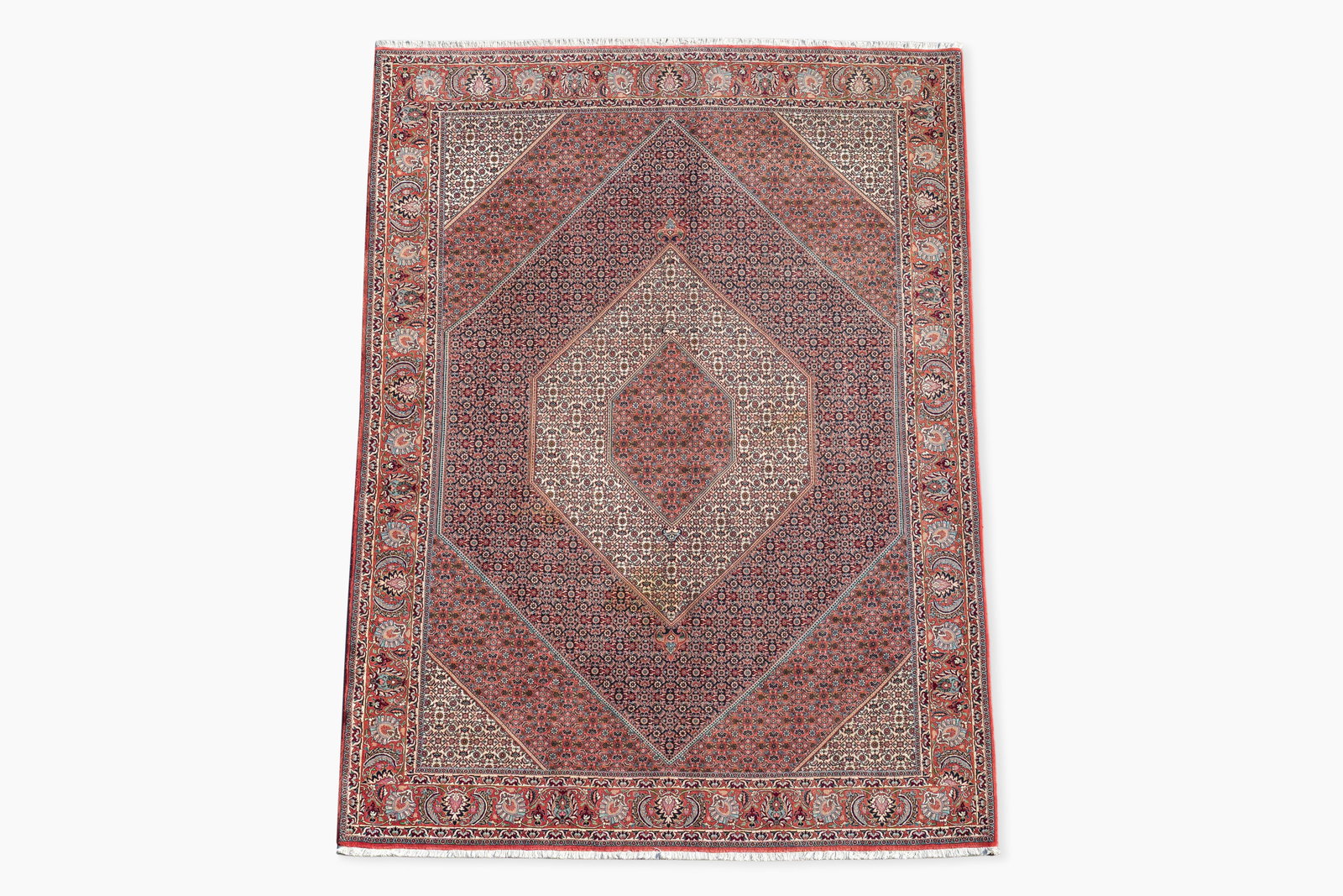 A Persian Bidjar rug with floral design, wool on cotton, 20th C. (1 of 8)