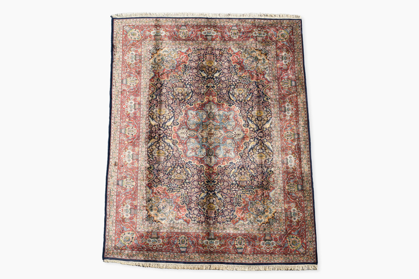 A presumably Indian Qom (Qum/Ghom) rug with floral design, wool on cotton, 20th C. (1 of 7)