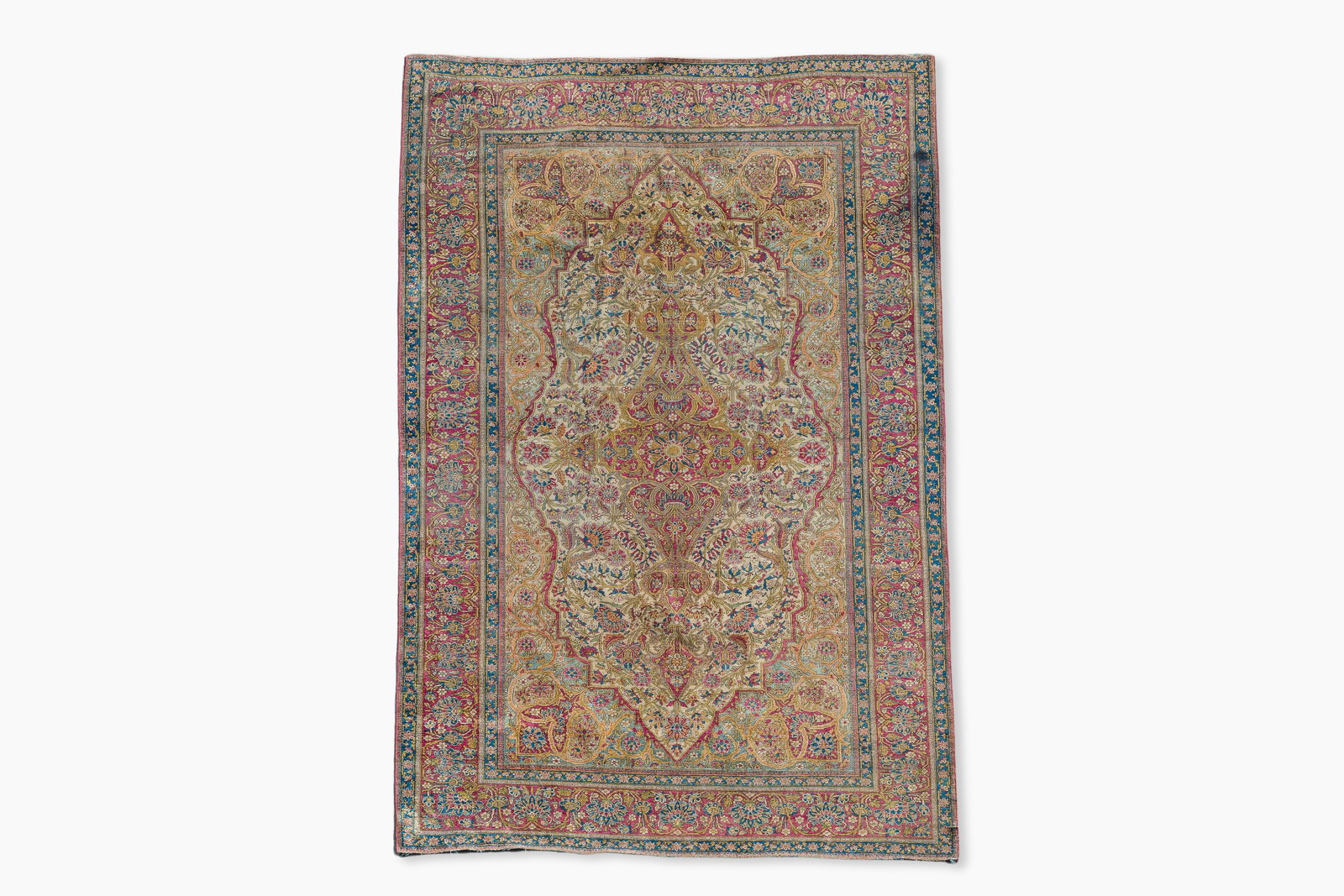 A Persian Kashan 'Mohtashem' silk rug with floral design, early 20th C. (1 of 6)