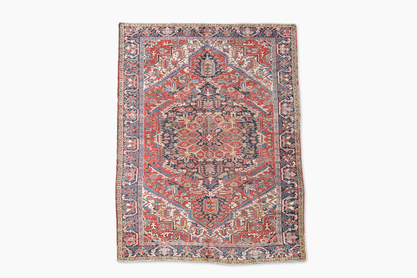 A Persian Heriz rug with floral design, wool on cotton, 20th C. (1 of 6)