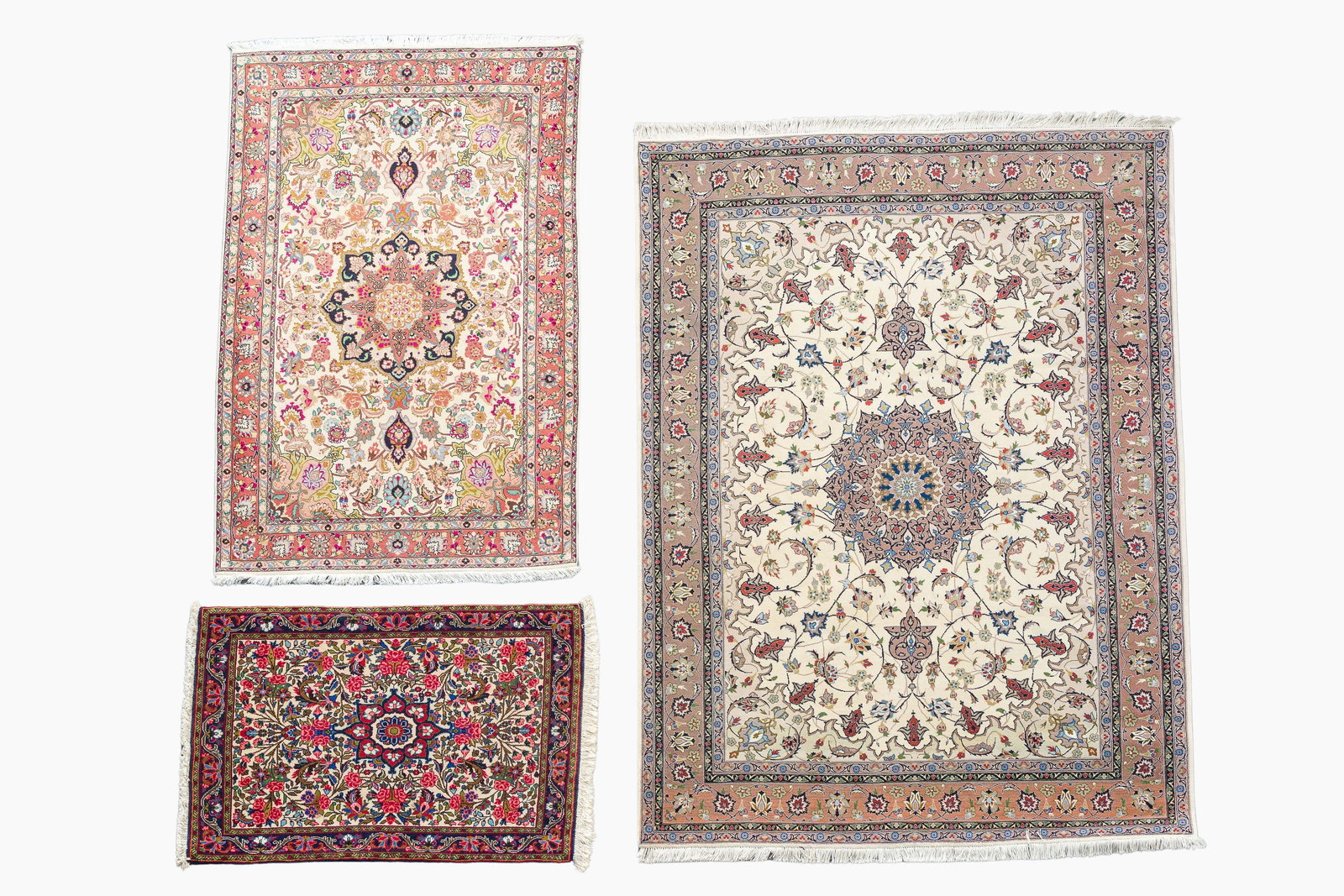 Three Persian carpets with floral design, Tabriz, Kashan and Sarough, wool on cotton, 20th C. (1 of 8)