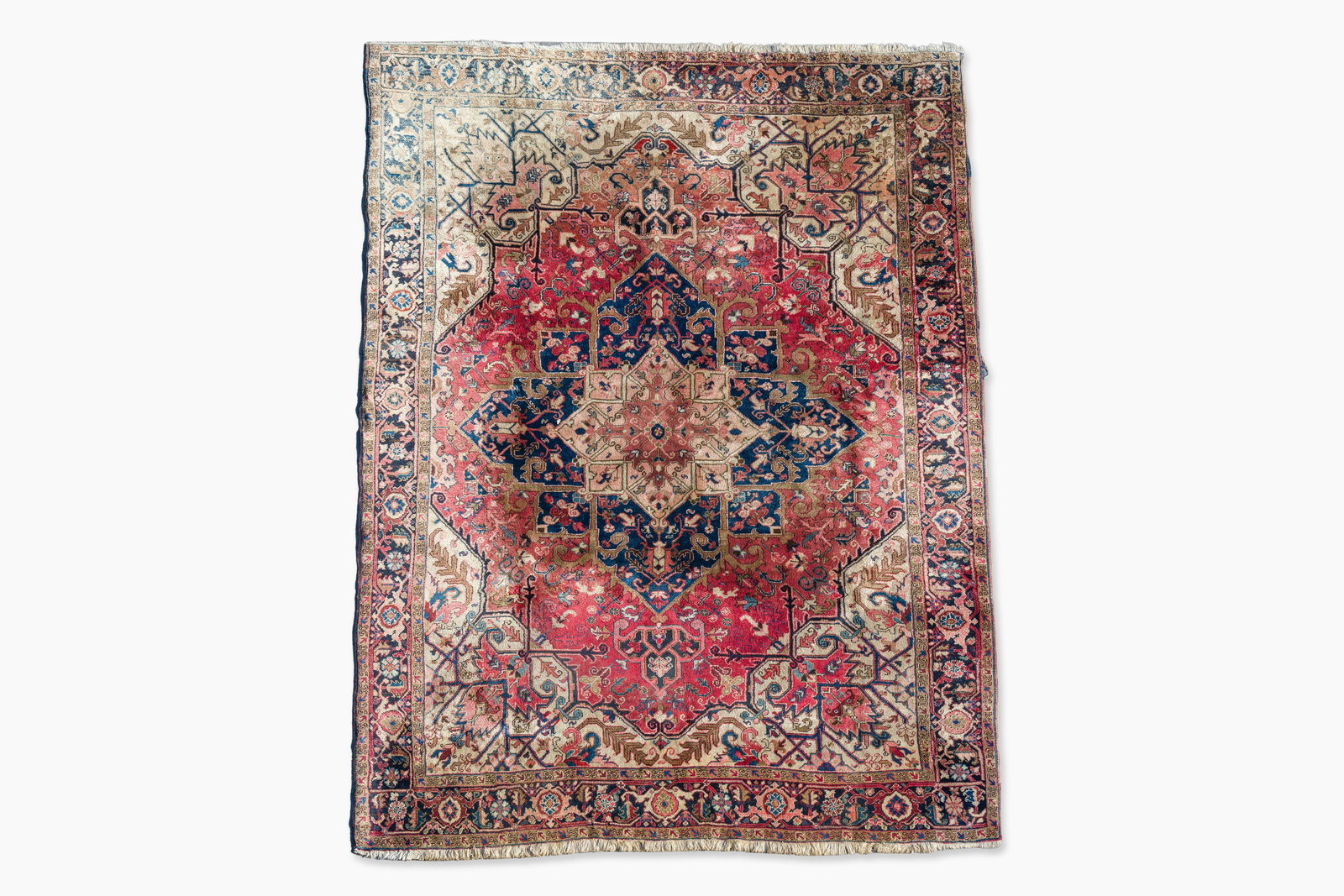 A Persian Heriz rug with floral design, wool on cotton, first half 20th C. (1 of 7)