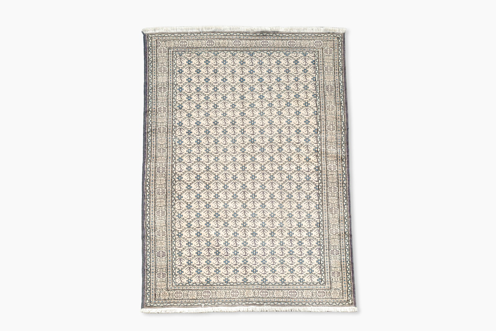 A Turkmen rug with geometric design, wool on cotton, 20th C. (1 of 5)