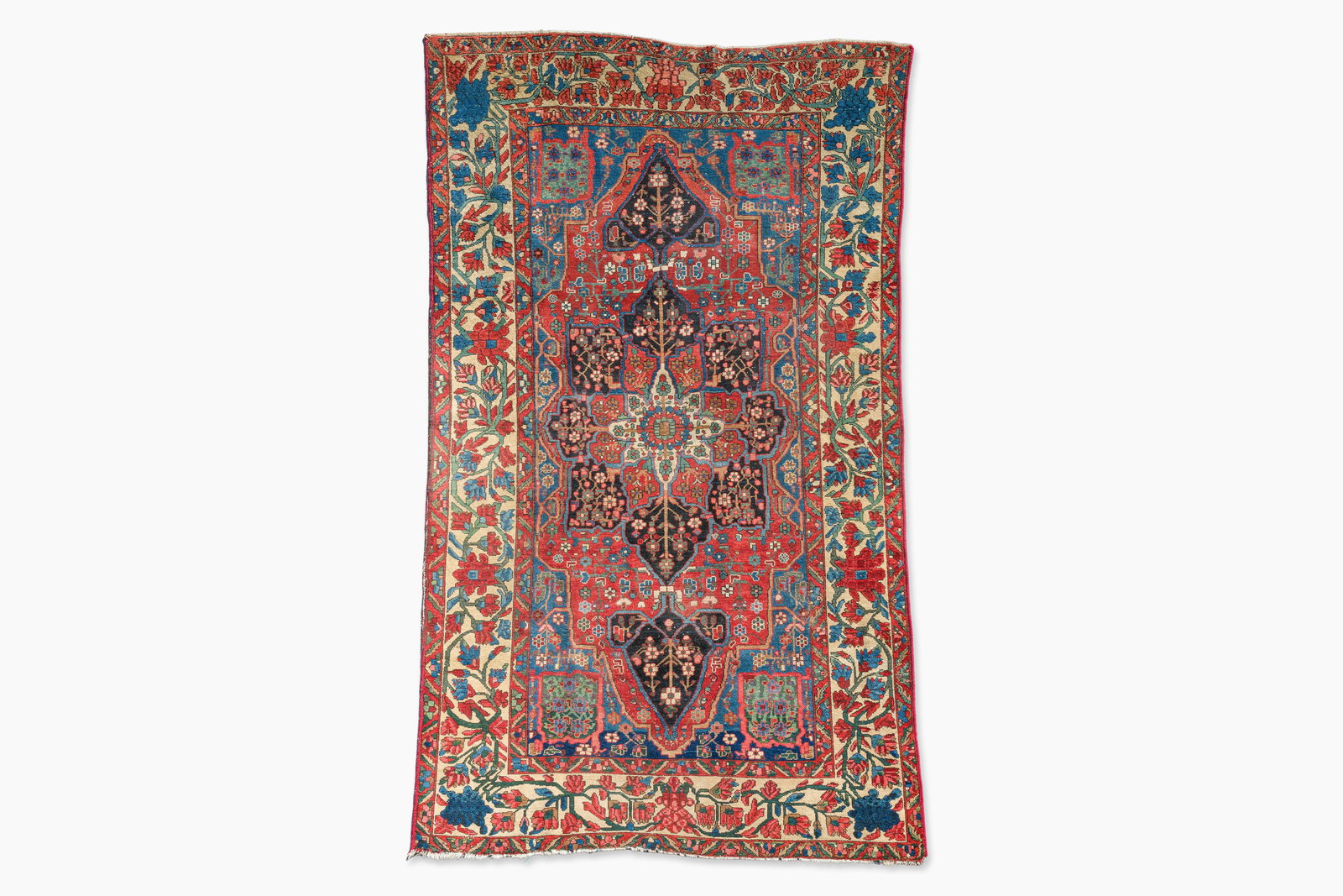 A Persian Bakhtiar rug with floral design, wool on cotton, 20th C. (1 of 5)