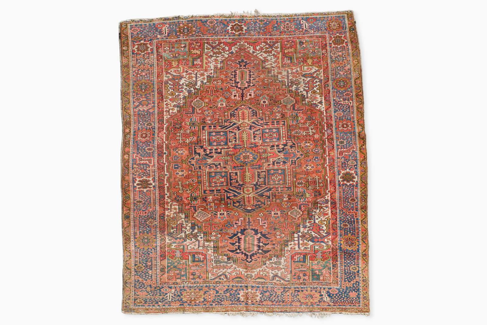 A Persian Heriz rug with floral design, wool on cotton, 20th C. (1 of 5)