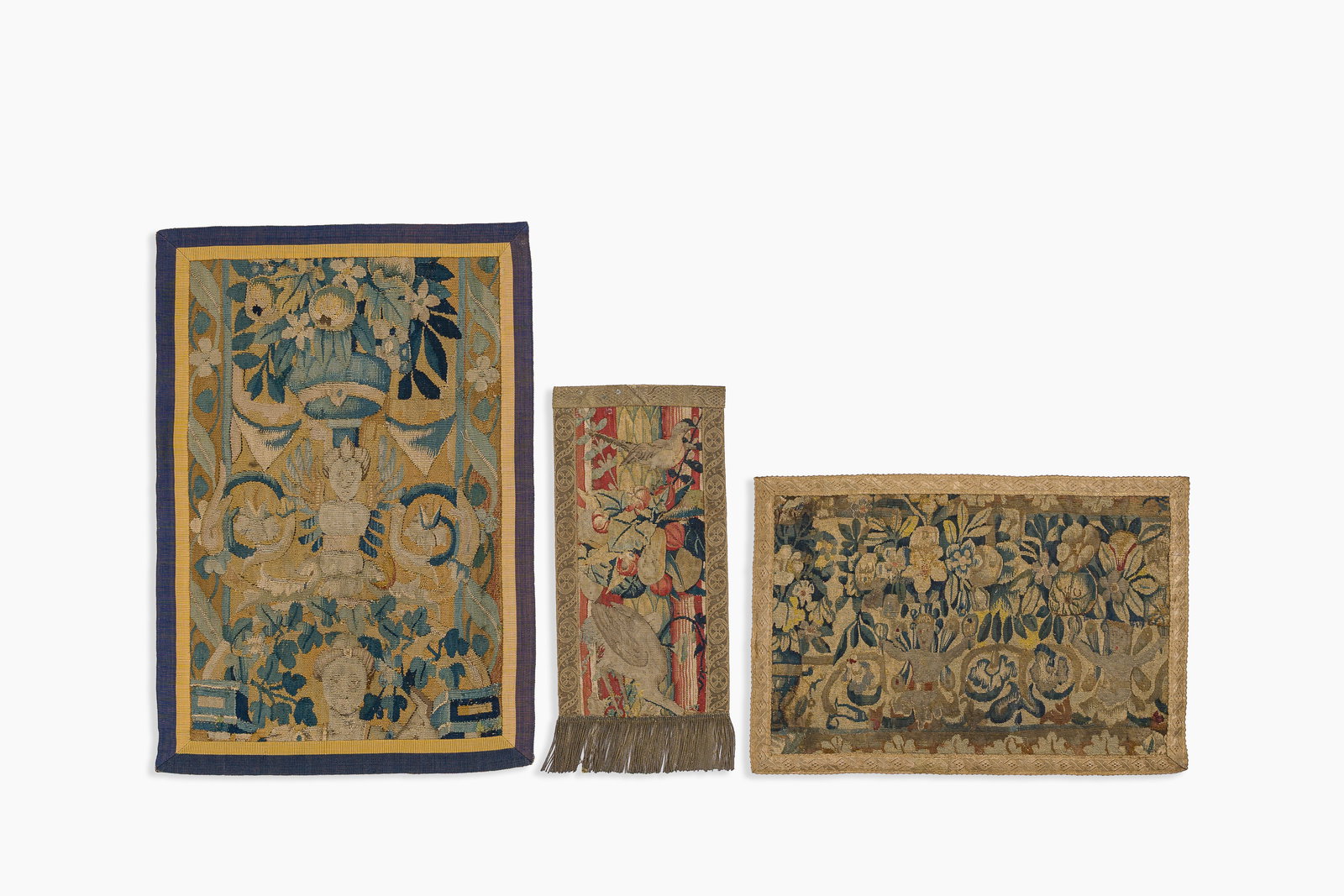 Three Flemish wall tapestry fragments with flowers, birds, and figures, 17th C. (1 of 6)