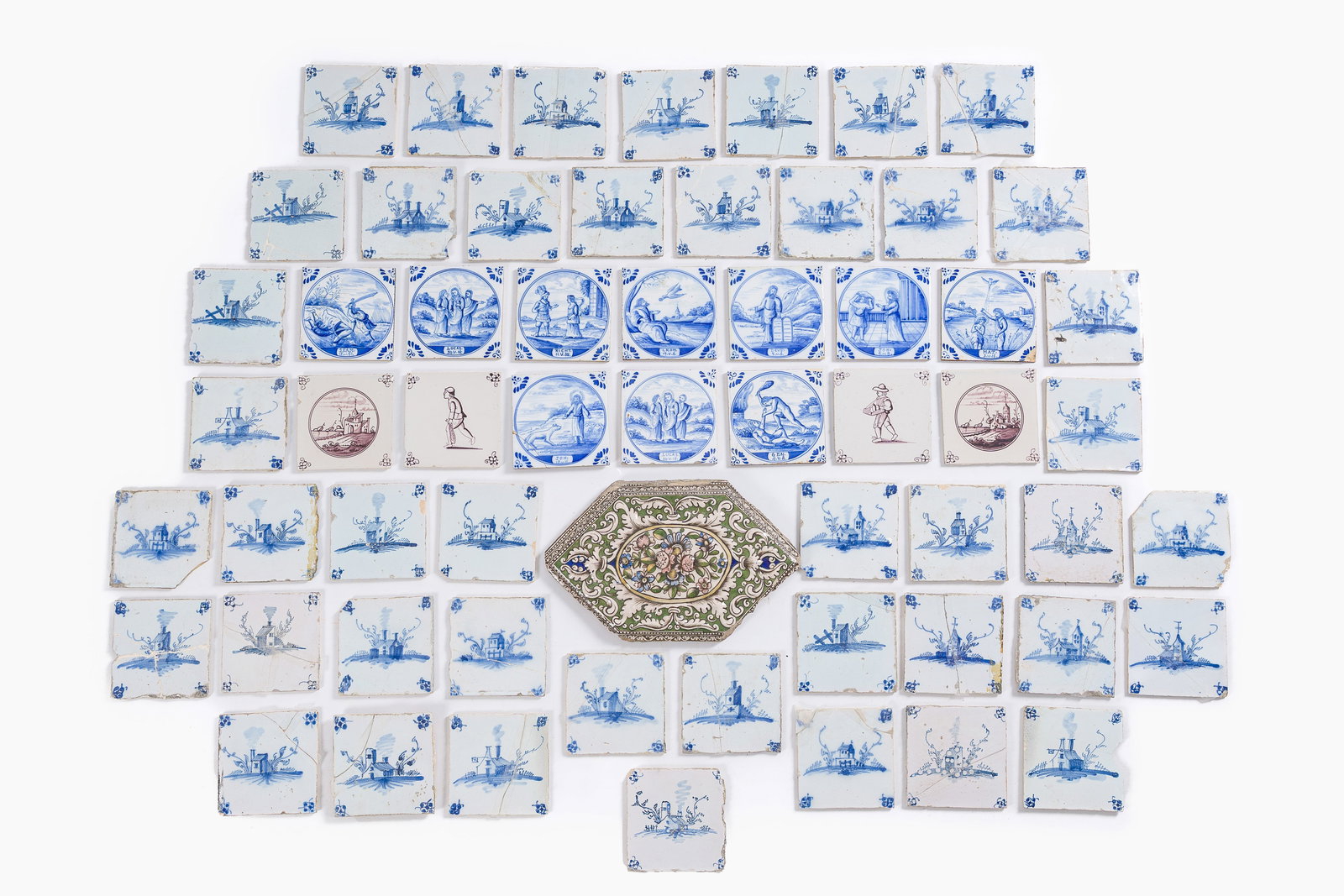 58 blue, white and manganese Delft tiles and a hexagonal Qajar tile, 18th/19th C. (1 of 2)